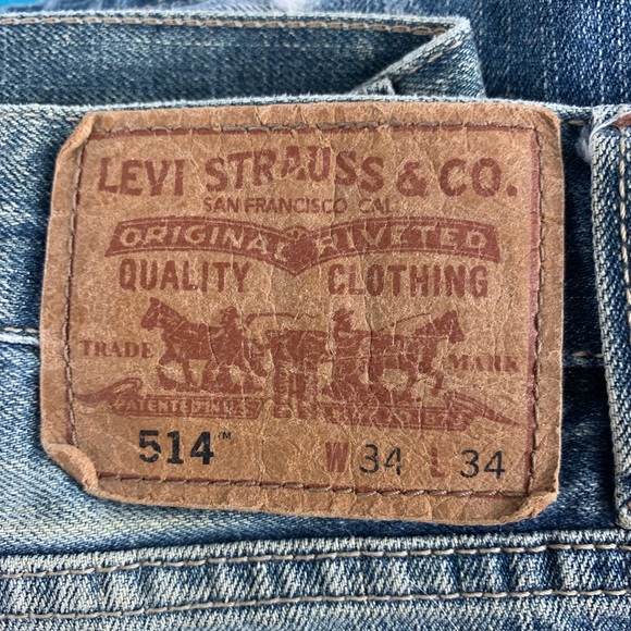 Levis 514.  Perfectly faded and softened to perfection.  Soft blue and shredded - Picture 15 of 16